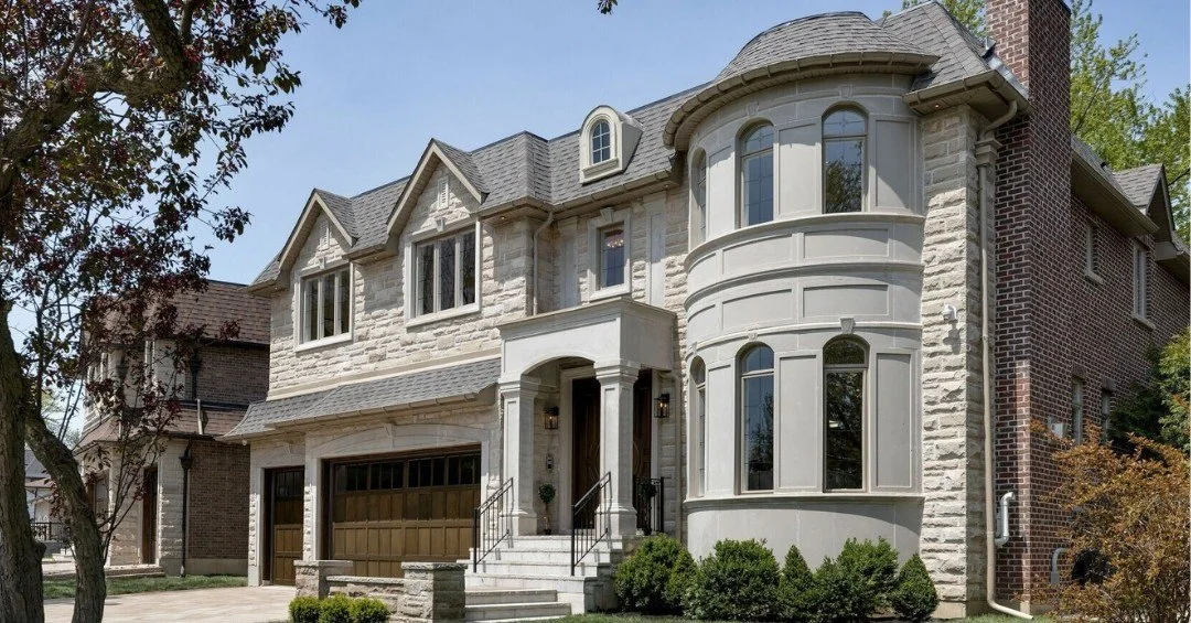 Side elevation of a substantial house with Wabash Queen-size brick and stone entrance detailing